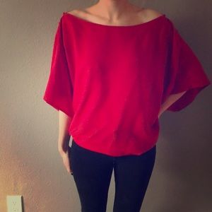 Red off the shoulder blouse.